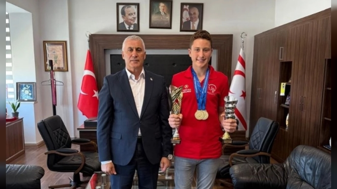 Ekonomi ve Enerji Bakanı Amcaoğlu, Balkan Şampiyonu Sandallı’yı kabul etti